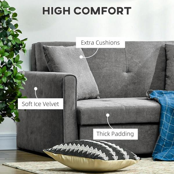 Light grey sofa bed with thick padded seat and armrests, extra cushions and throw