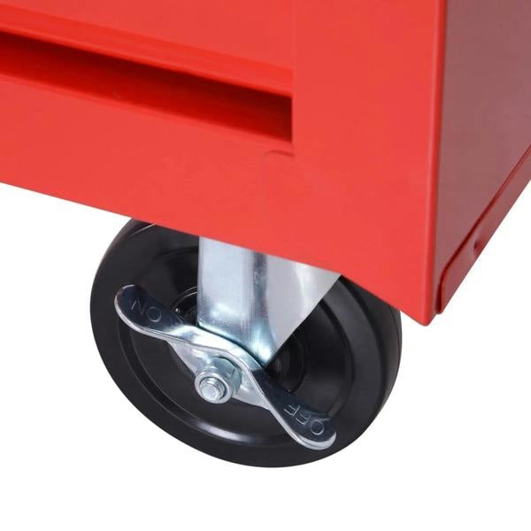 Close-up of tool cabinet caster wheel with steel mounting bracket