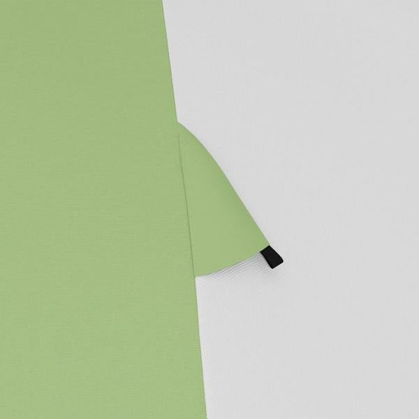 Green and grey tent fabric seam with corner reinforcement and stitched edge