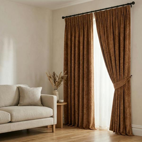 Athens made-to-measure curtains in Sundown, styled in a living room