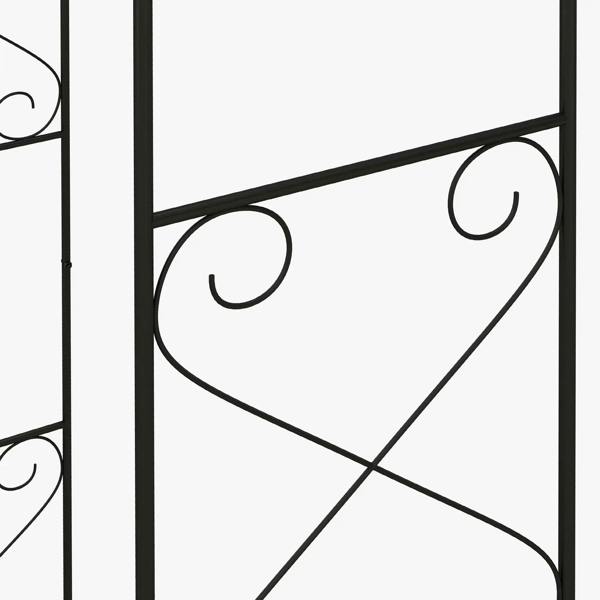 Close-up of black gate panel showing heart scroll pattern and crossing bars