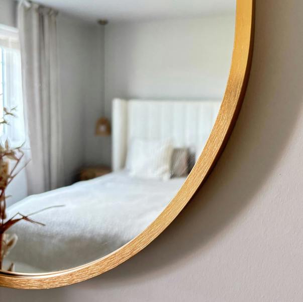 Downton Interiors Gold Modern Metal Frame Oval Wall Mirror - 70cm