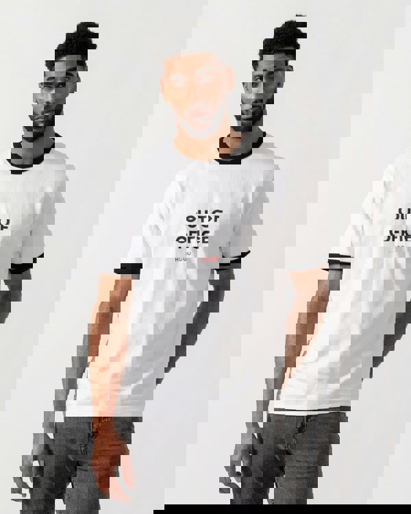 Model wearing HUGO Out-Of-Office T-Shirt in White 100 - Main