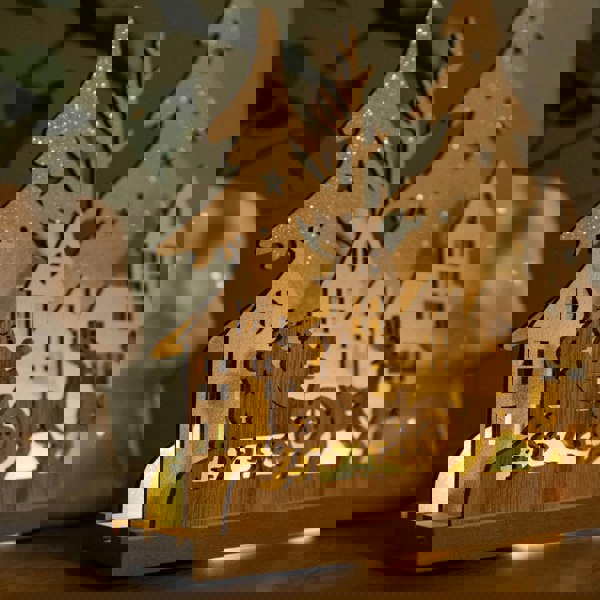 Samuel Alexander 20cm Battery Operated Light up Wooden Village with Santa in Sleigh and Warm White LEDs