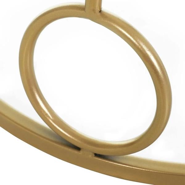 Gold-tone metal ring support detail for a round coffee table frame