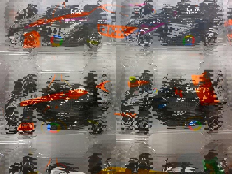 McLaren Formula 1 Set of 7 Cars with Display Stand 1:43 Scale Bburago 38169