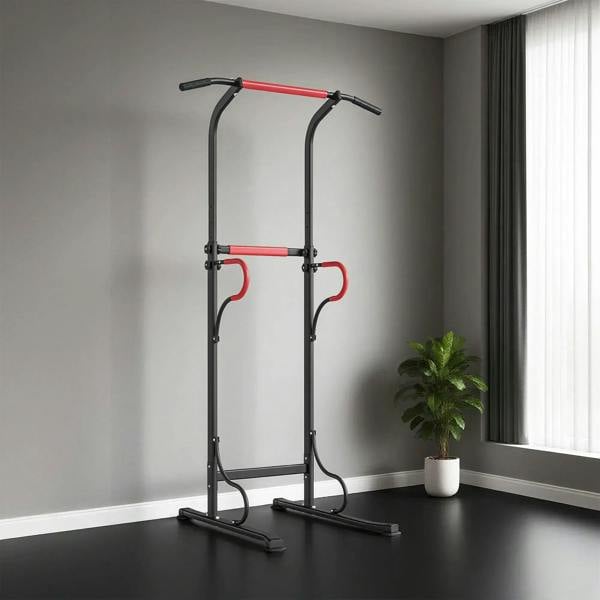 Adjustable height power tower pull-up station with overhead bar and red handles on black steel frame