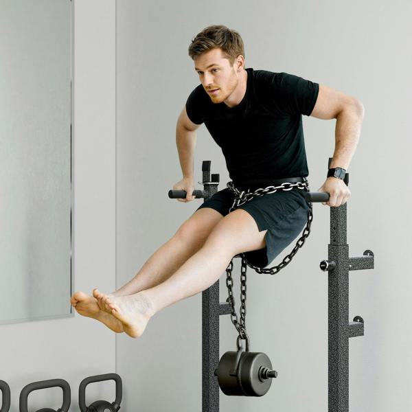Squat rack with barbell on hooks and safety chain attachment for added support