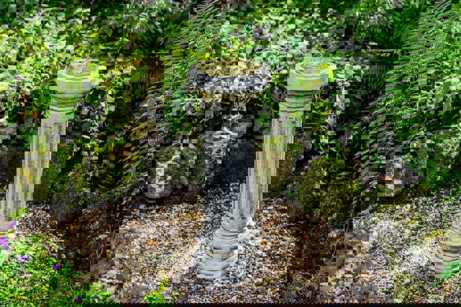 Large Sundial On Classic Stone Column