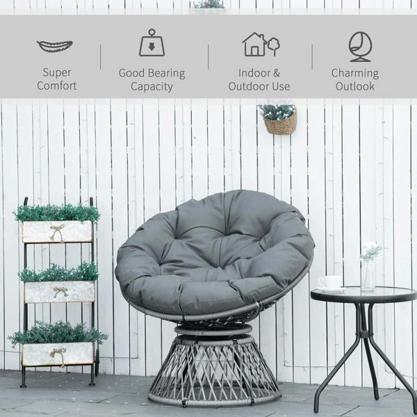 Grey cushioned Papasan swivel chair with woven rattan basket base and round seat