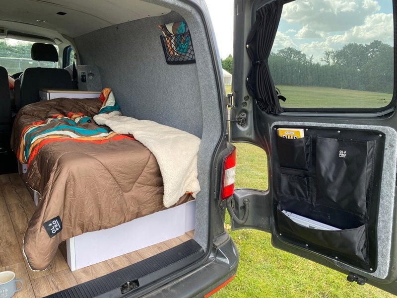 An image of the right hand side of the VW T5/T6 Barn Door Storage Organiser showing the inside of the campervan.