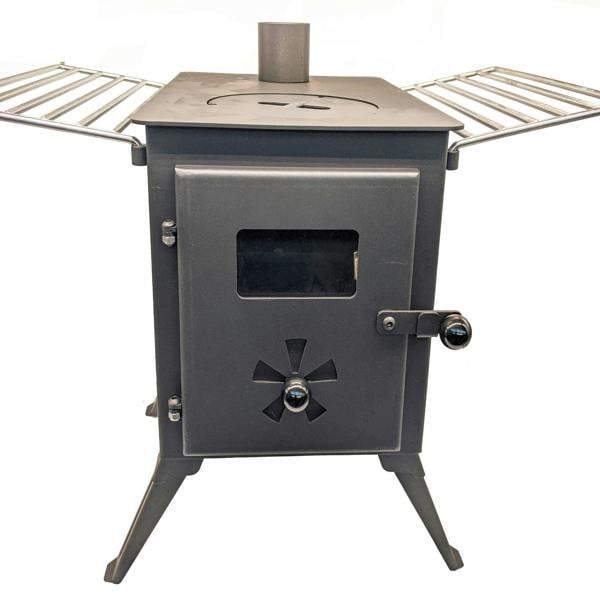 Black metal wood stove with two metal grates on a white background