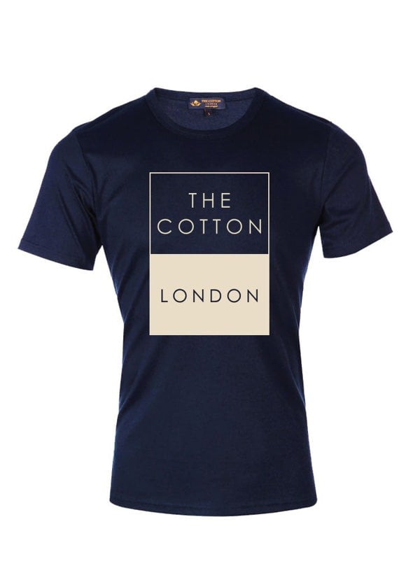 The Cotton London's brand name and logo printed in grey on a Navy T-shirt.