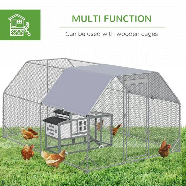 Outdoor chicken coop with slanted roof and wire mesh enclosure, with chickens nearby