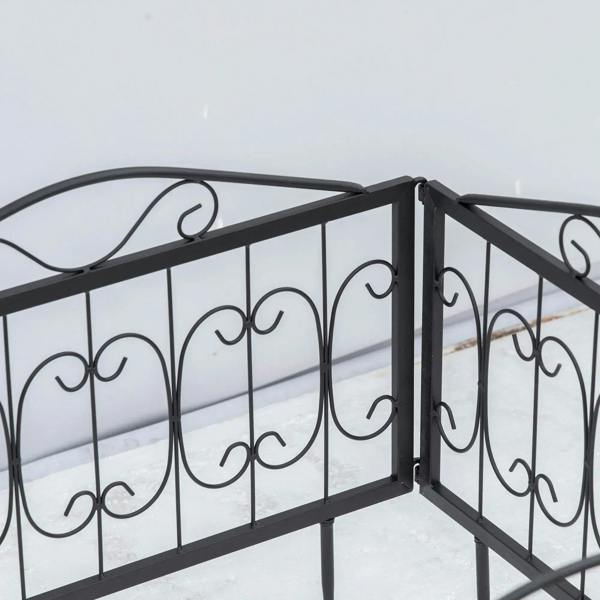 Black metal fence panels with corner joint, arched top rail, and curled scroll accents