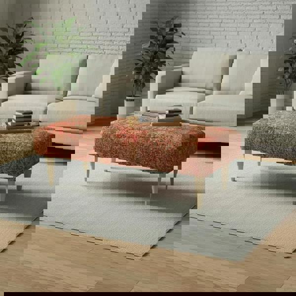 Modern rectangular upholstered bench with artistic statement fabric and solid wooden legs