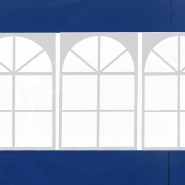 Close-up detail of white arched window insert panels on a blue gazebo side wall panel