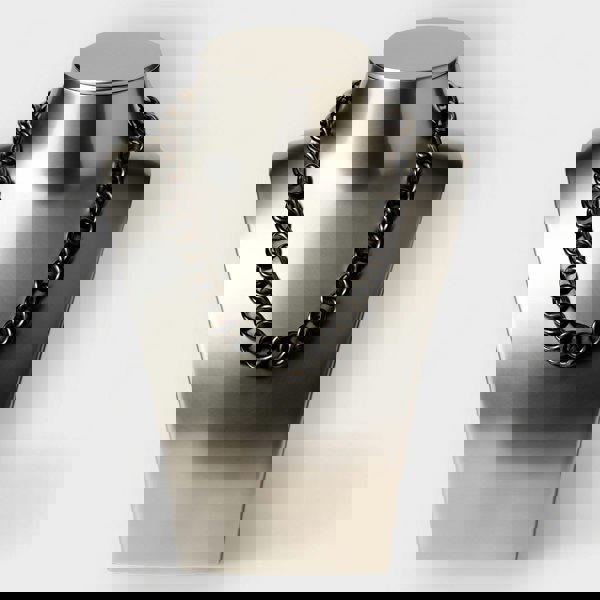 Black Aluminium Chain necklace on a metallic mannequin bust against a white background