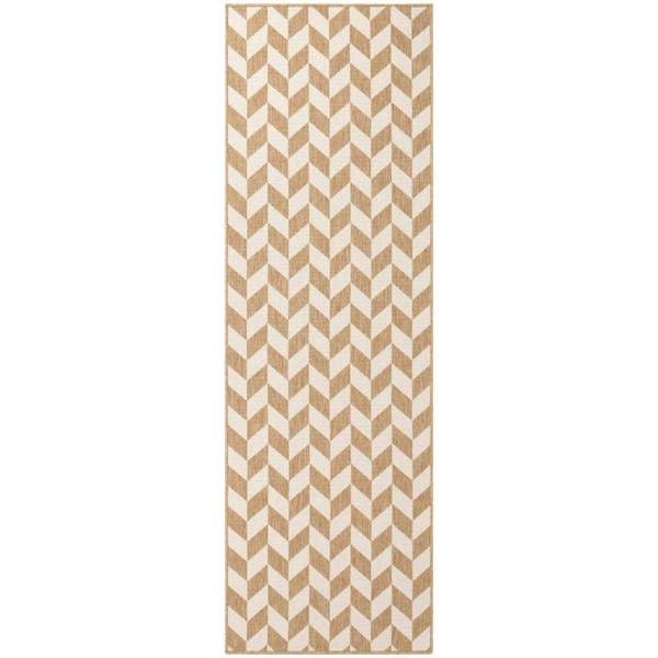 Beige and white chevron patterned rug on a white background