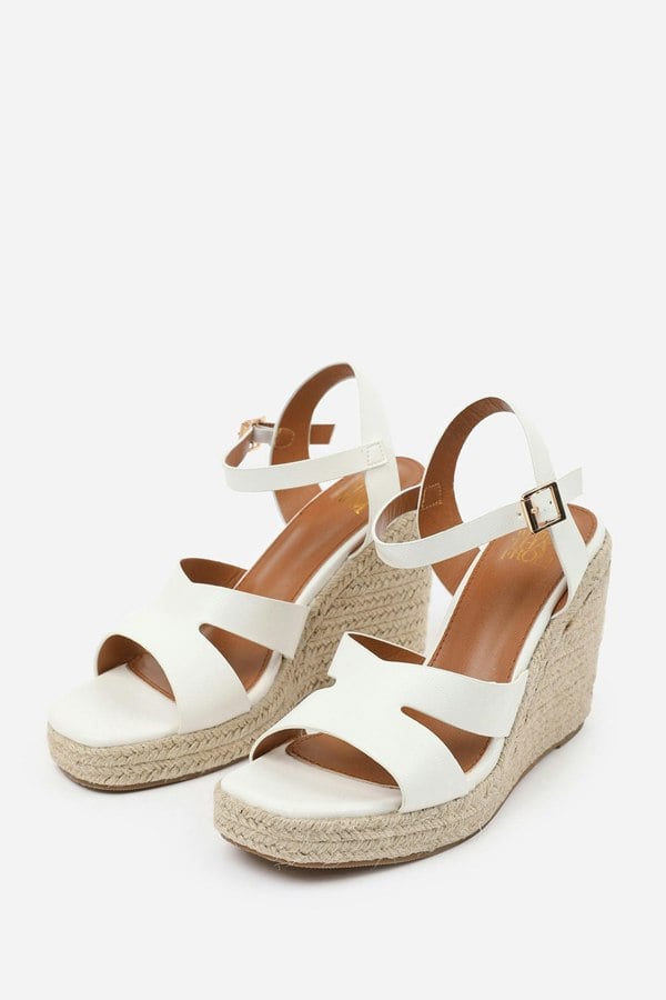 Where's That From Sansa Wide Fit Cut Out Strap Detail Wedge Shoes With Buckle Closure in White Grain Pu