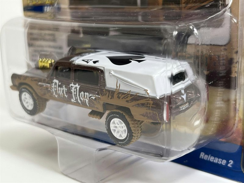 Johnny Lightning Custom Haulin Hearse Dark Copper Metallic with Mud Splatter 1:64 Scale JLSF024B