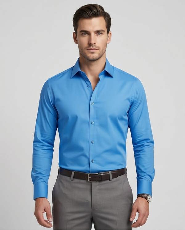 Man wearing a blue dress shirt and gray pants on a light gray background