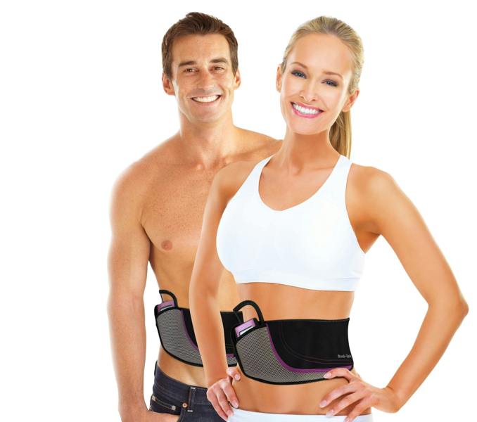 A smiling man and woman stand side by side against a clean white background, both wearing the Ab Toning, Exercising & Firming Belt. The woman sports a white sports bra, while the shirtless man shows off defined abs.