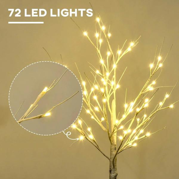 Artificial birch tree with warm white LED lights and glowing branch tips close view