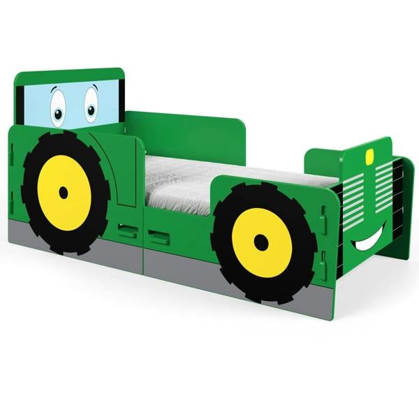 Toddler bed at an angle. It shows how the tractor graphics look on the footboard, left side and headboard panels.