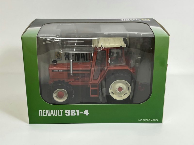a toy tractor in a box