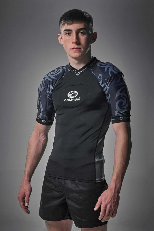 Black Optimum Razor protective top with grey tribal-print padded shoulders, front view on model - Optimum