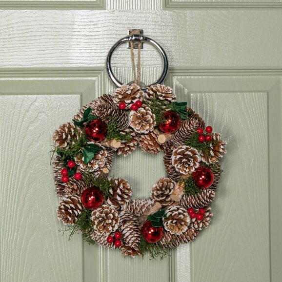 Samuel Alexander 30cm Hanging Christmas YuleFest Wreath with Red Baubles & Snow Tipped Pine Cones