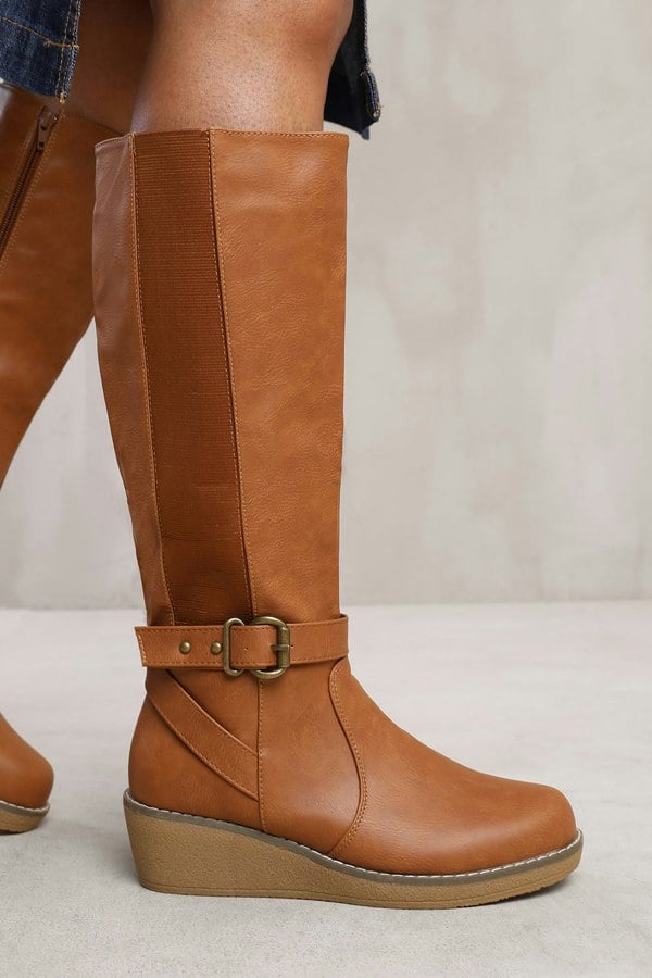 Where's That From Vanda Wedge Heel Knee High Boots With Elastic Panel in Tan