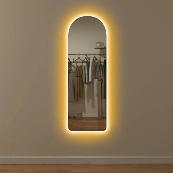 Arched LED mirror, clear glass with warm light border, full-length view