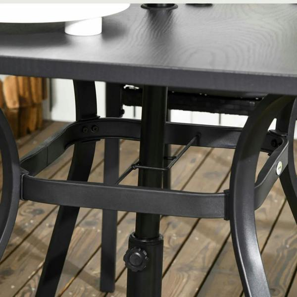 Black dining table underside with frame supports and crossbars