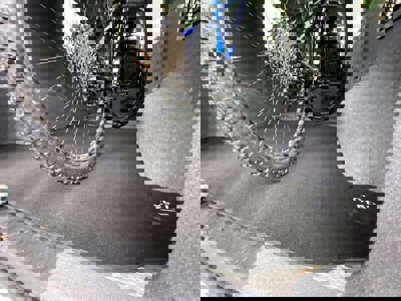 SWB T5, T6 Kombi Boot Carpet by OLPRO pictured in use with a mountain bike in the boot.