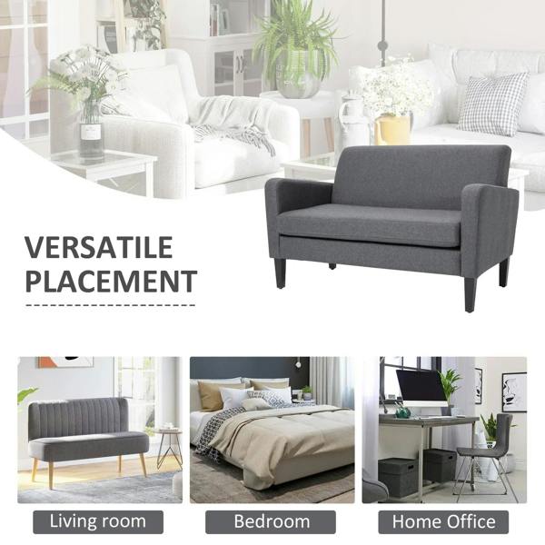 Charcoal grey loveseat sofa with curved arms and tapered wood legs