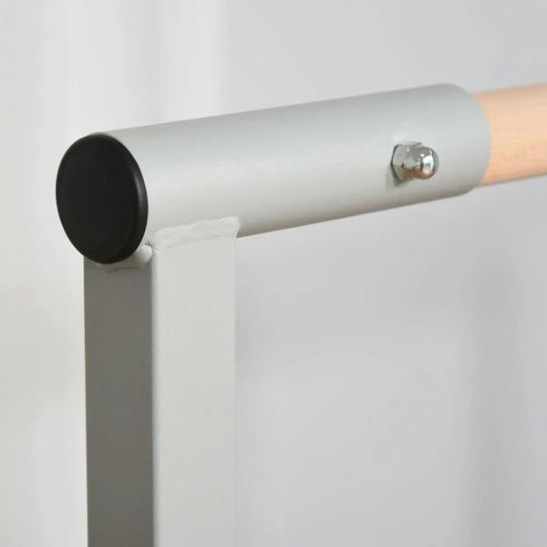 Close-up of bar end cap and connection point with screw on the horizontal bar
