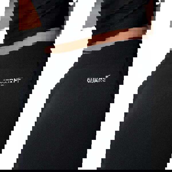 Black Speedo Endurance+ swim shorts with textured high-waisted leggings