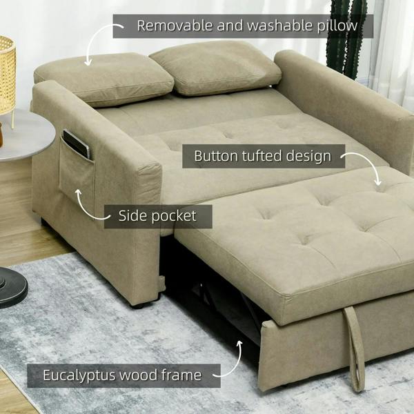 Light brown sofa bed extended flat with side pocket, button tufting, and removable pillows