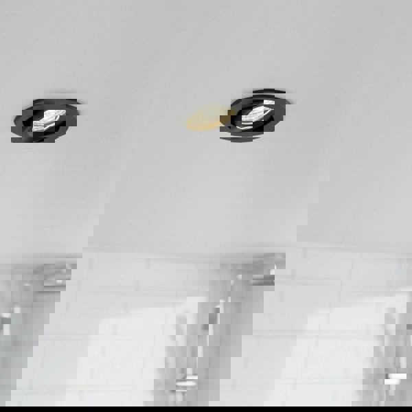 black bathroom downlight fitted in a modern bathroom ceiling 