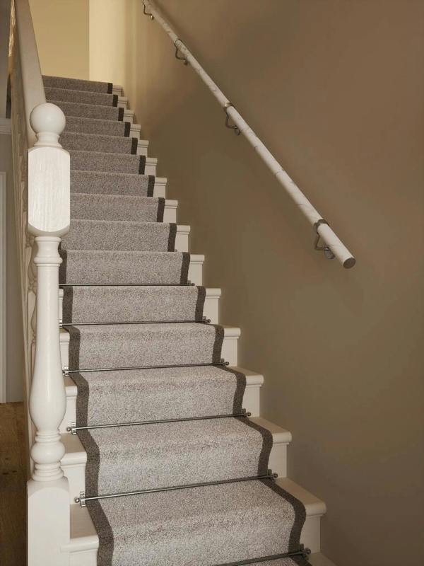 hallway view of Montford Soft White Marble Straight Flight Handrail