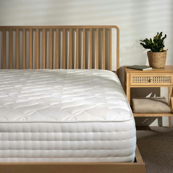 Next Generation 2000 Spring Mattress styled in a bedroom | Soak and Sleep