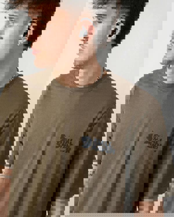 close up shot of a model wearing a Fjallraven Swedish Forest Mens T-Shirt in Laurel Green 625