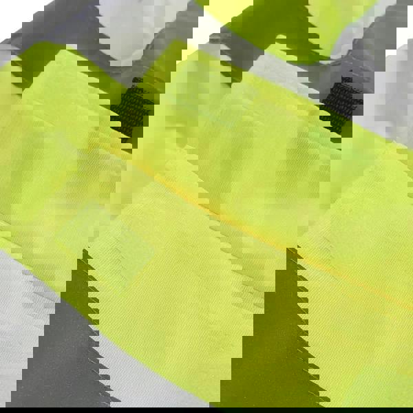 Scruffs High Visibility Mens Hi-Viz Technical Zip Up Vest, close-up of the bright yellow reflective safety vest with Velcro fastenings in high visibility yellow fabric.