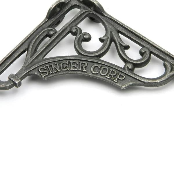Pair of Antique Cast Iron Singer Corp Shelf Brackets