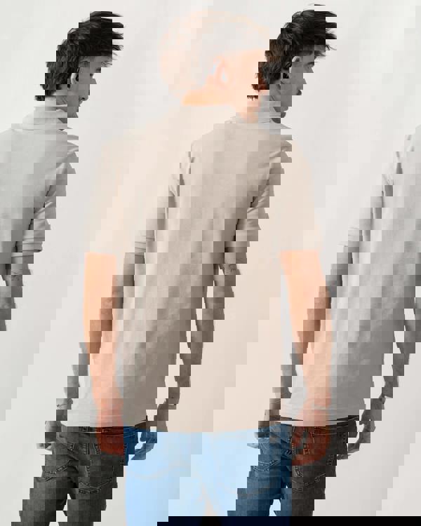 back shot of a model wearing a BOSS Orange Passenger Mens Stretch-Cotton Slim-Fit Polo Shirt with Logo Patch in Open Grey 070