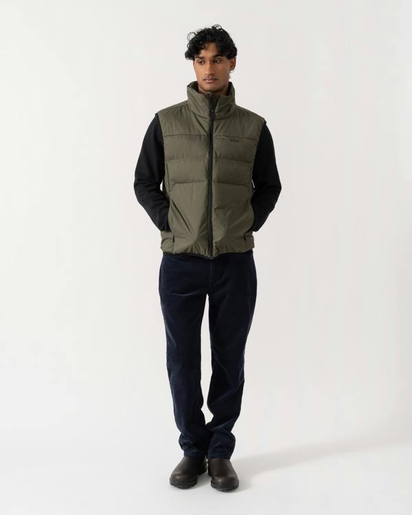 Man wearing BOSS Green OW Urbanex Mens Puffer Gilet - Open Green 398