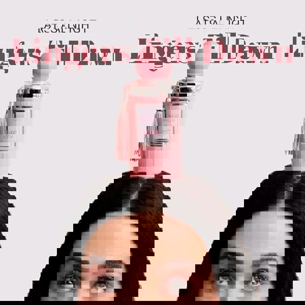 Sapil Naughty Vanilla Oud Unisex EDP 100ml Pink perfume bottle on a woman's head with text 'Lasts All Night Lingers Till Dawn' on a light pink background