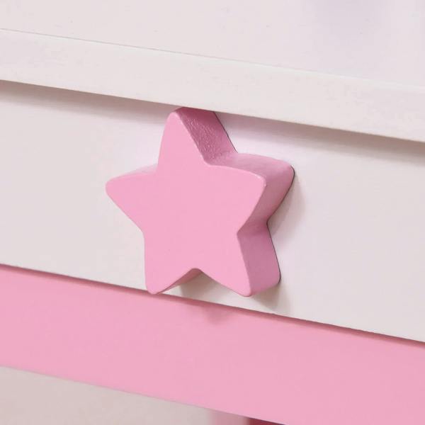 Pink drawer knob shaped like a star on kids dressing table